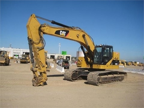 Caterpillar 328D de segunda mano a la venta Ref.: 1404347426637723 No. 2