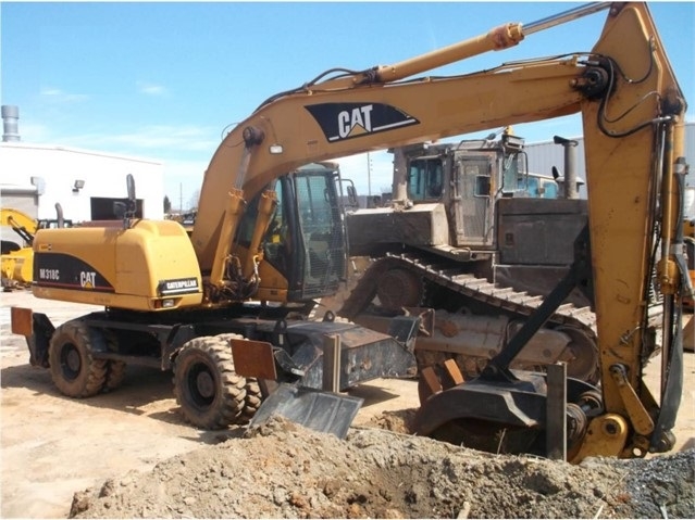 Excavadora Sobre Ruedas Caterpillar M318C usada a la venta Ref.: 1560529700312045 No. 4